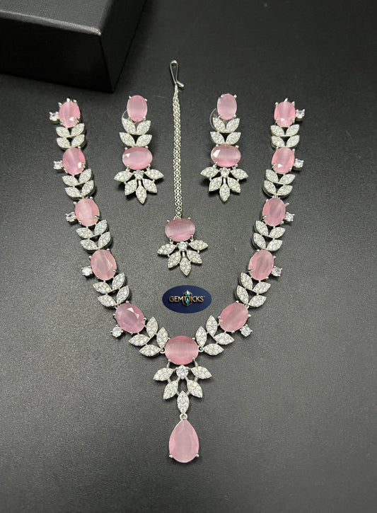 Soft Rose Pink American Diamond bridal jewellery set featuring a leafy zircon design and silver-toned plating.